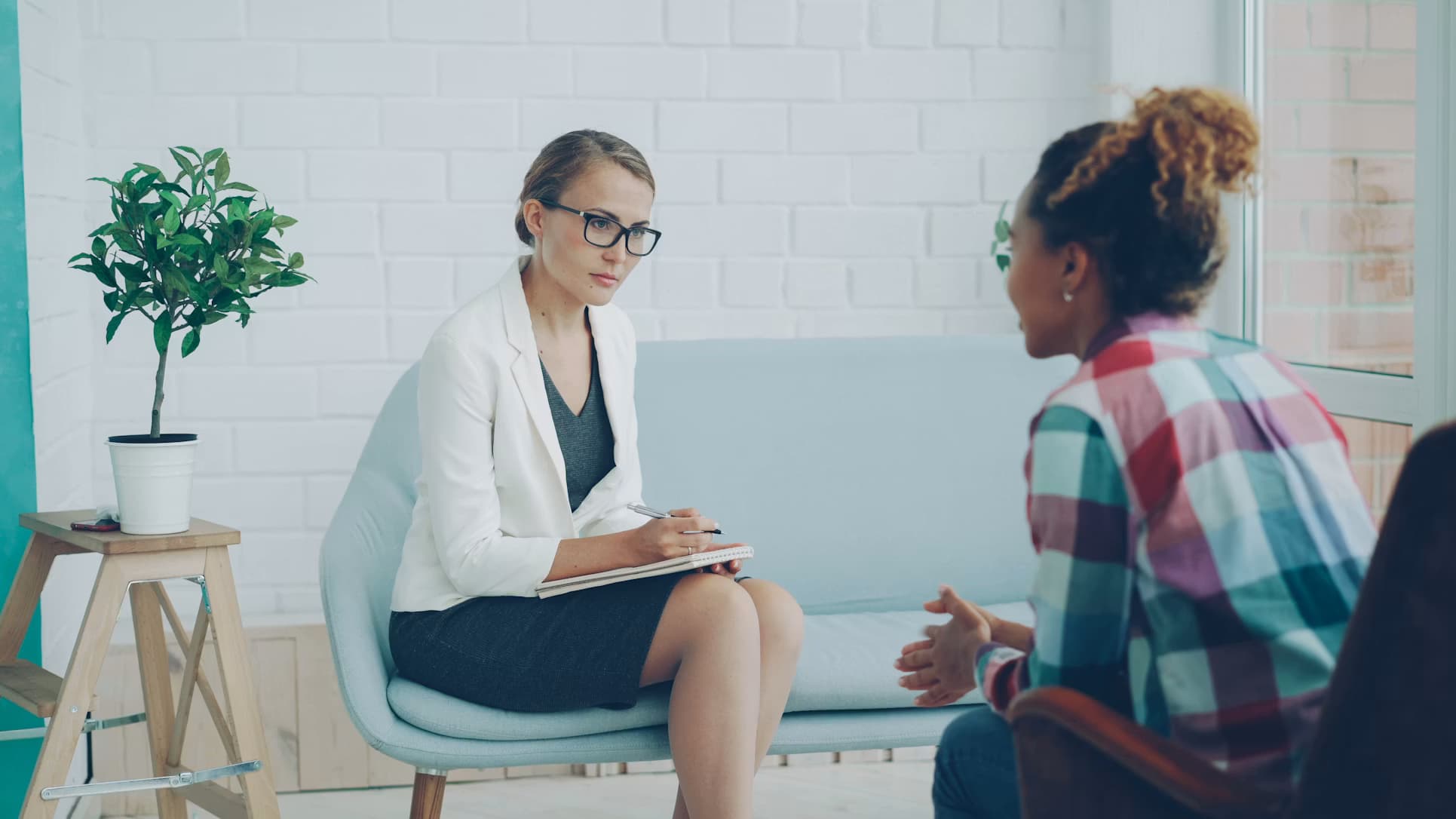 A practitioner listening during a consultation